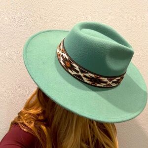 Felt western hat. Adjustable. New, never worn.